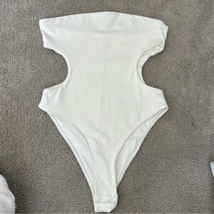 White strapless bodysuit with cutout sides swimsuit